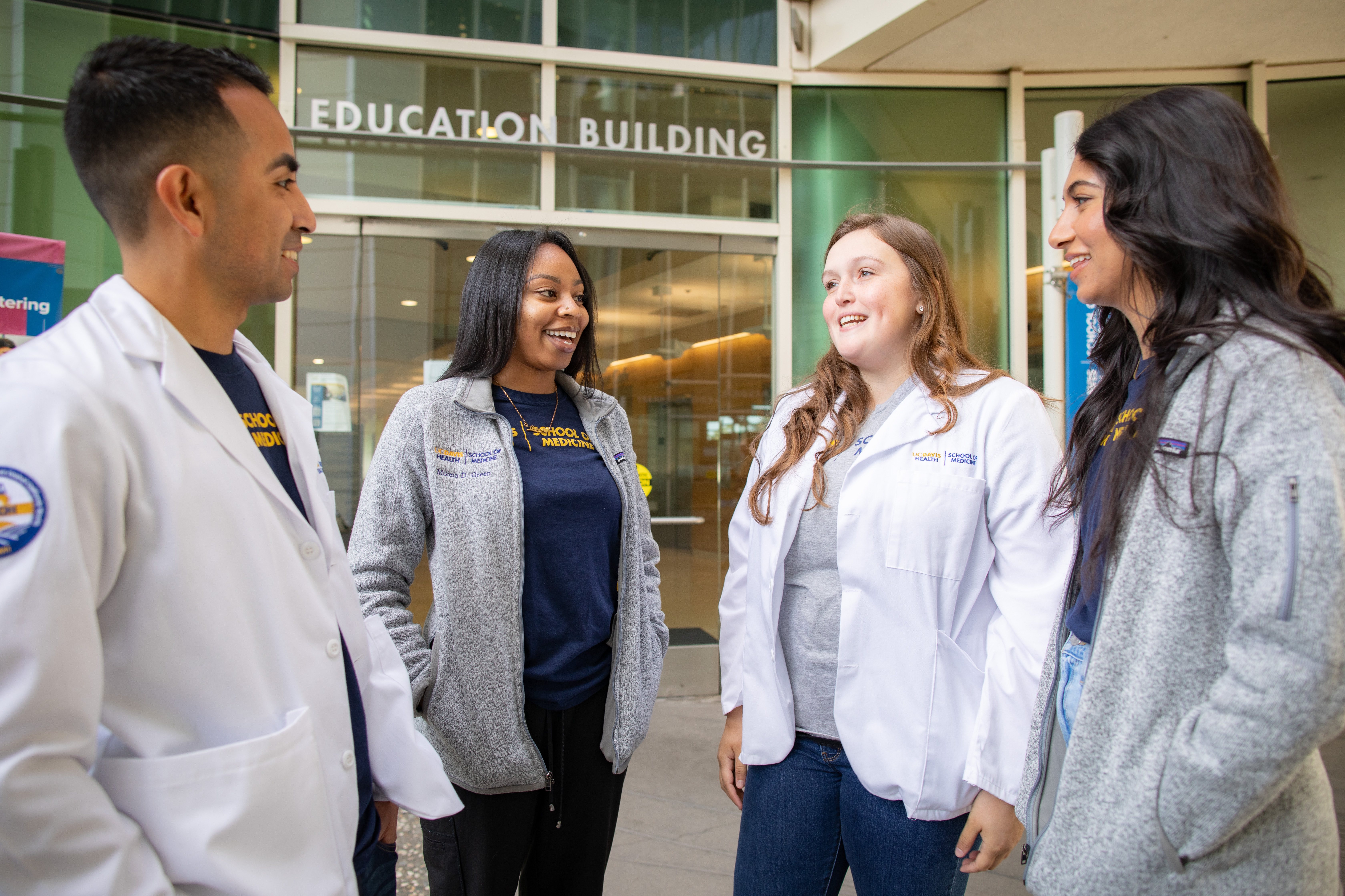 medical school students outside education building